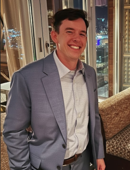 Professional headshot of Ben Booth - Chief Voice AI Officer specializing in AI consulting and enterprise solutions - TitanWave AI